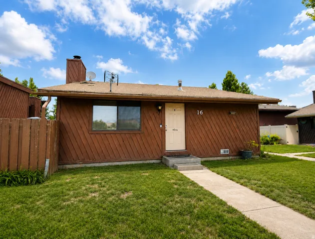 Warm cedar exterior gives this home a welcoming feel with direct access to street parking.