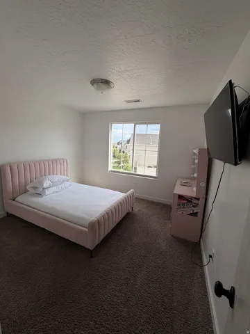Textured ceiling with a flush-mount light fixture