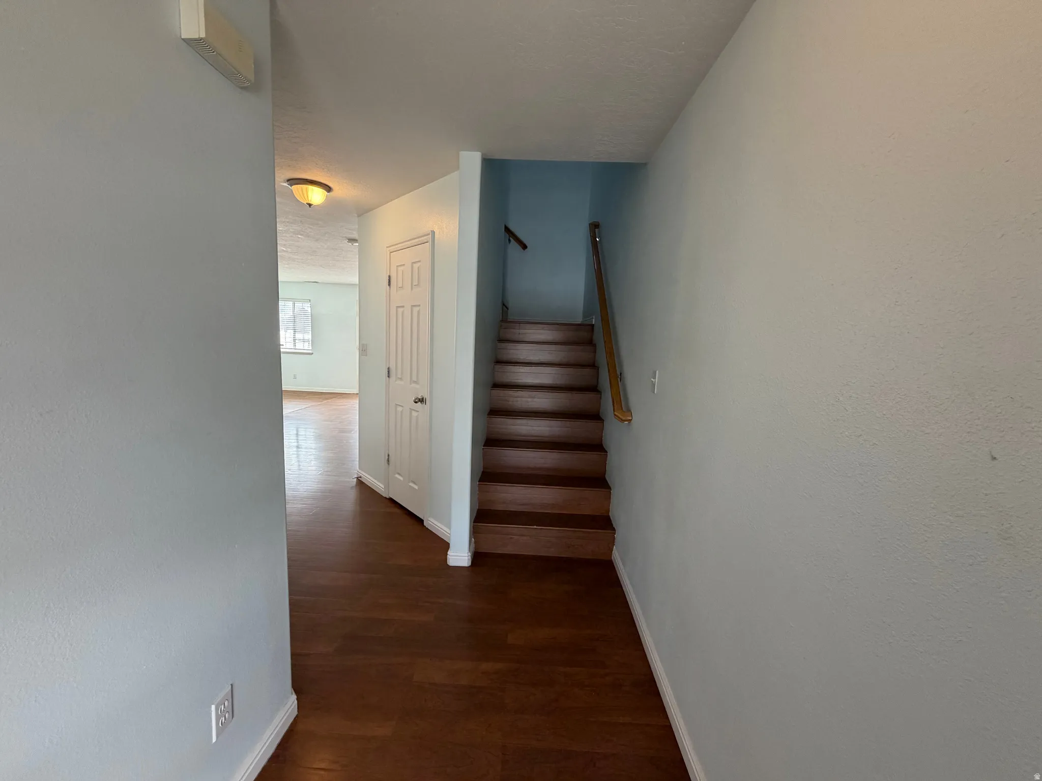 Wood-finish flooring throughout the main level