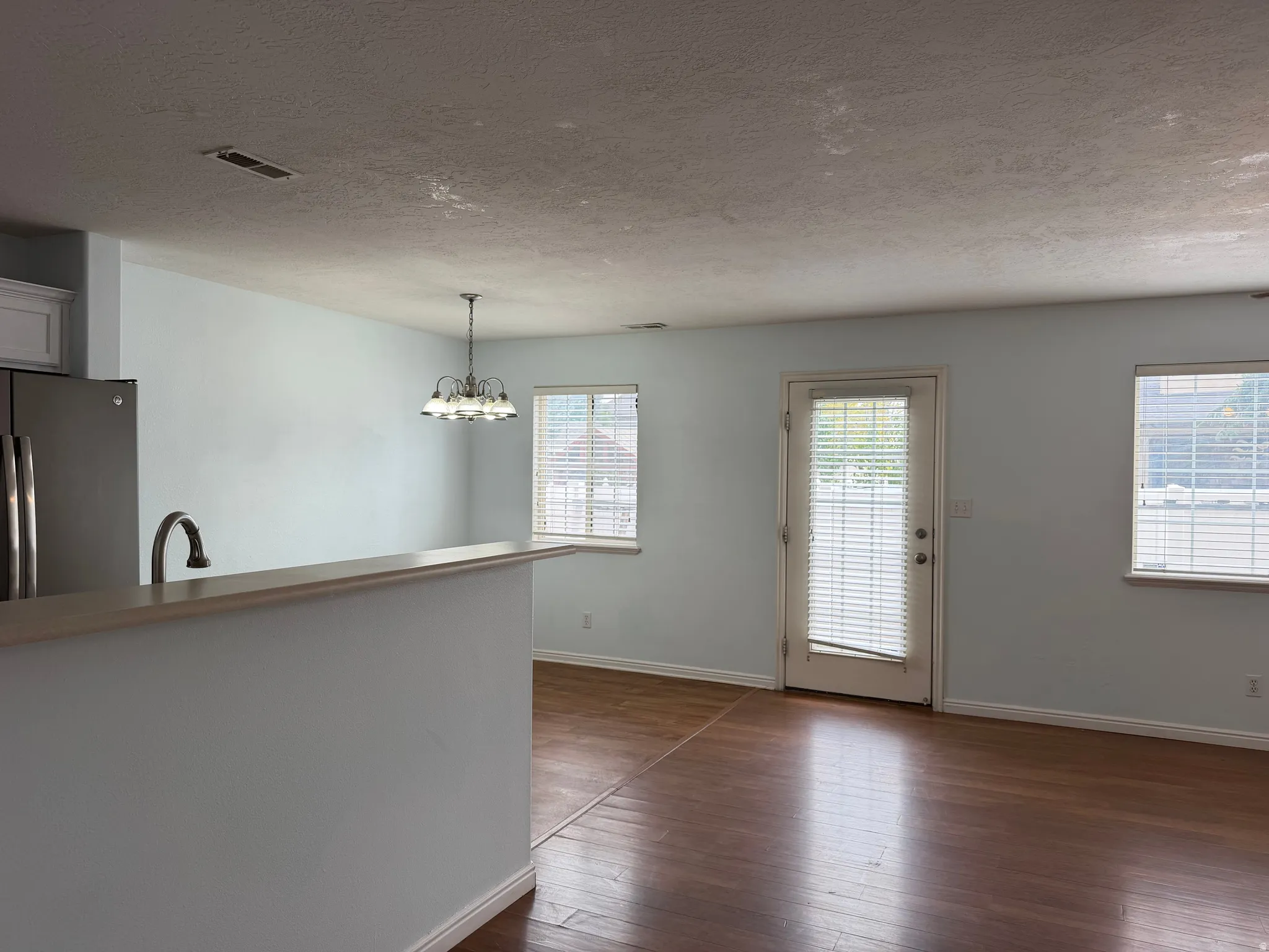 Wood-finish flooring throughout the main living area