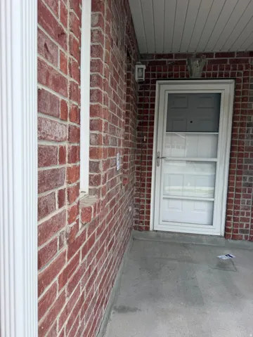 Brick exterior with white trim