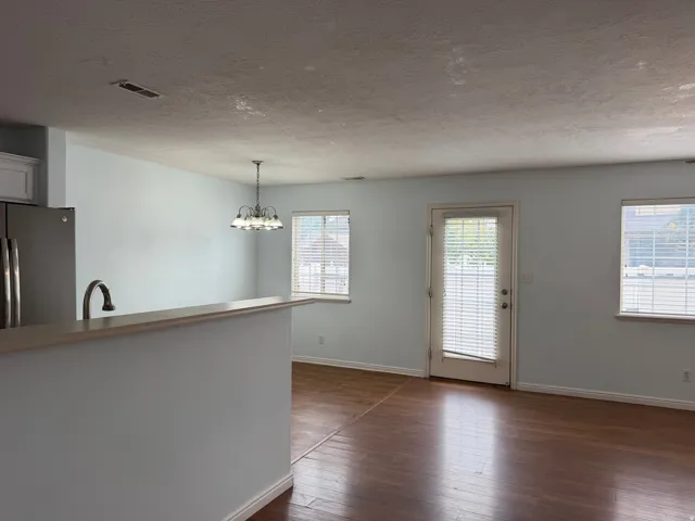 Wood-finish flooring throughout the main living area