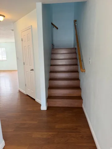 Rich wood-finish flooring throughout the main level
