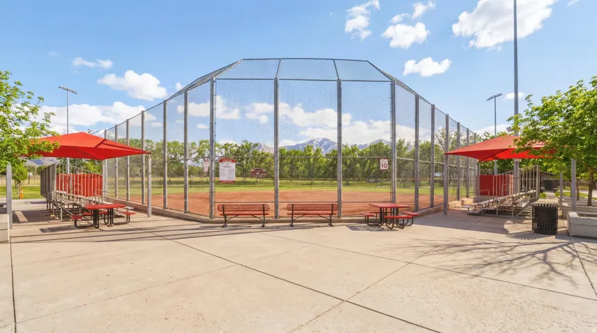 Baseball field with a chain-link fence enclosure