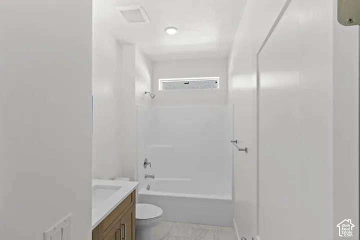 This photo is the same size and layout, but the actual bathroom has a white cabinet.