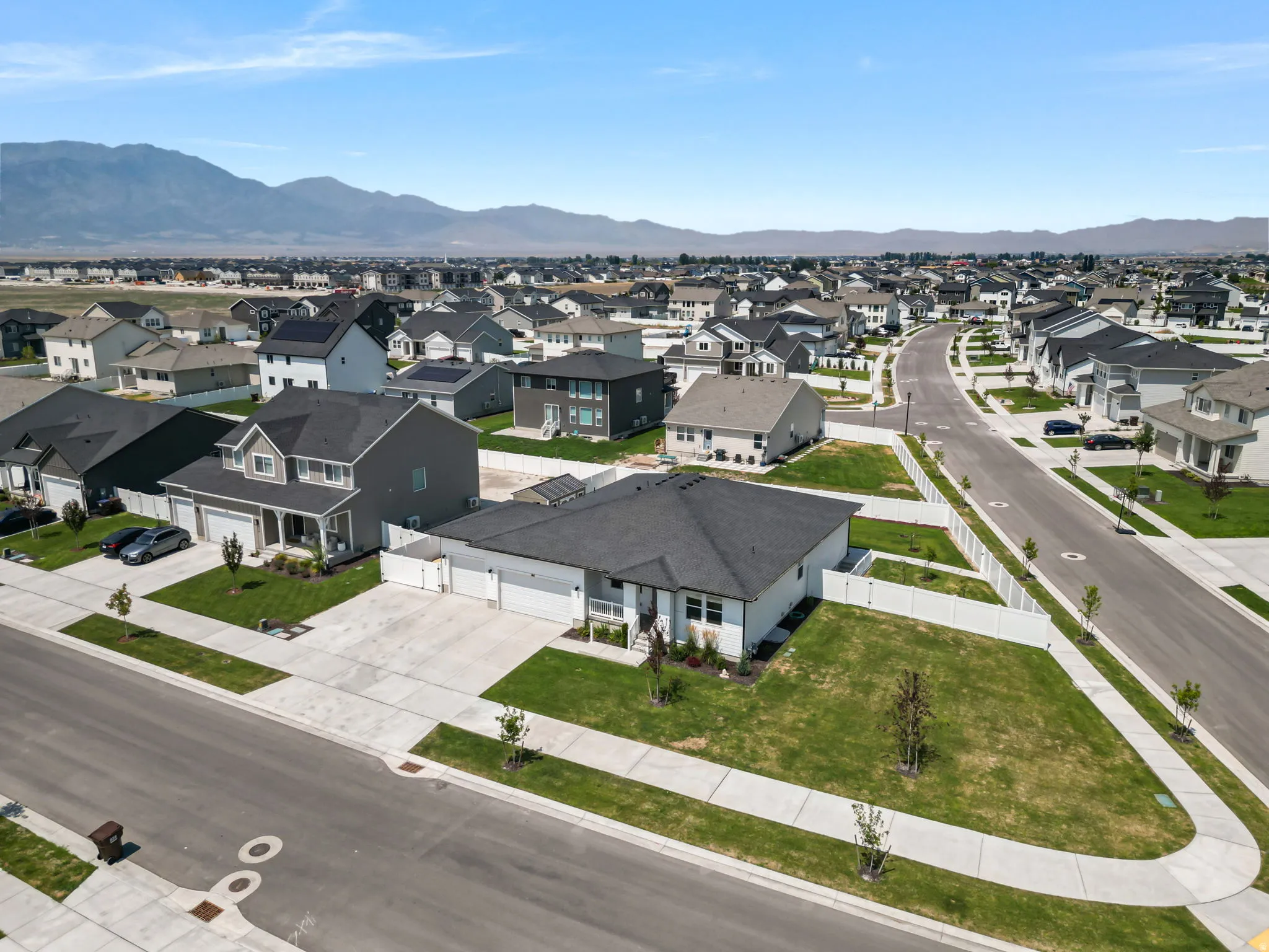 Corner lot property with mature landscaping and mountain scenery