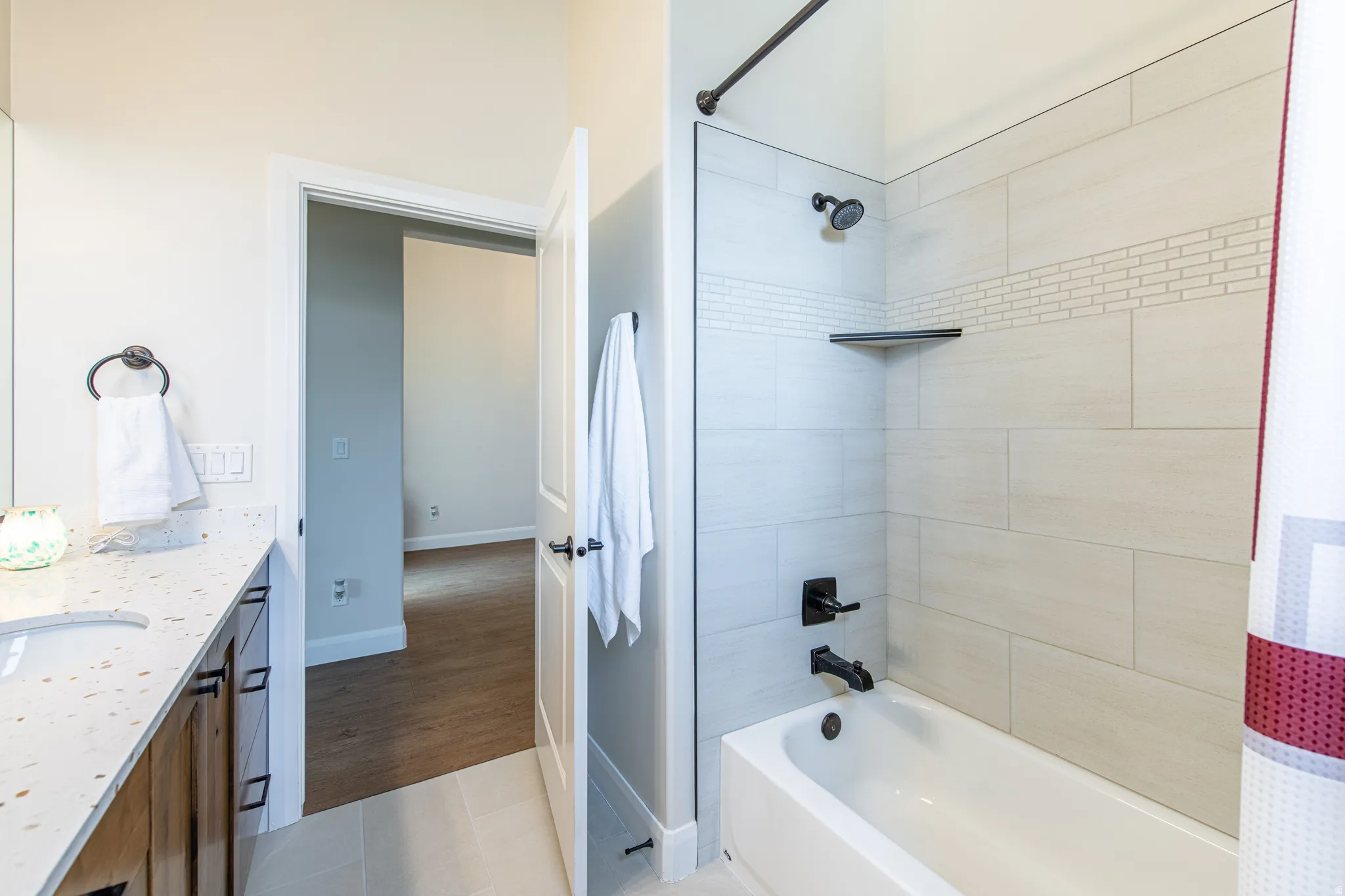 White porcelain bathtub with matte black fixtures