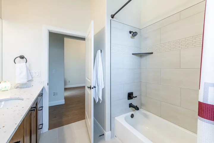 White porcelain bathtub with matte black fixtures
