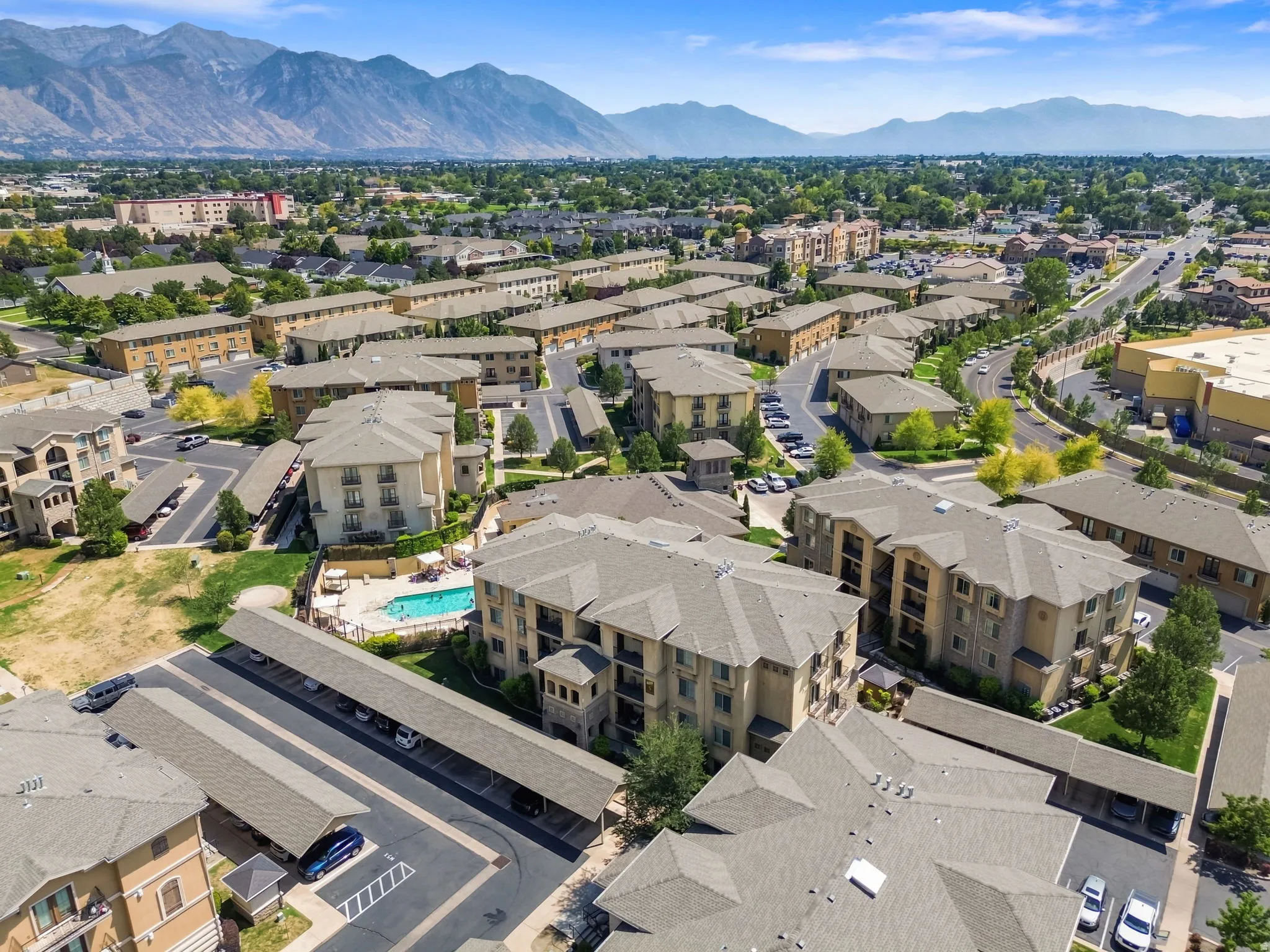 Modern multi-unit residential complex featuring contemporary architectural design with clean lines and neutral exterior finishes