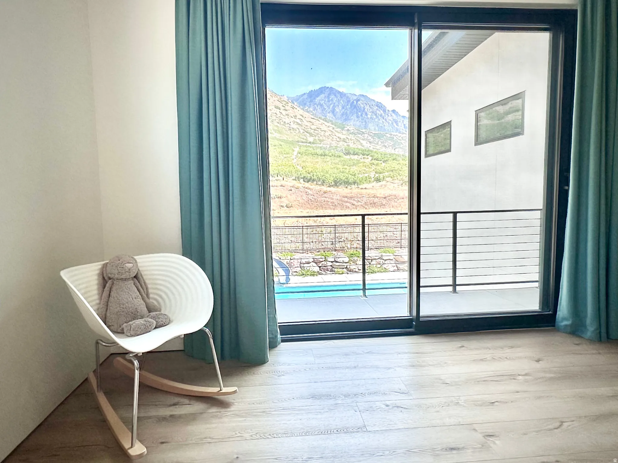 Sliding glass doors opening to an exterior balcony