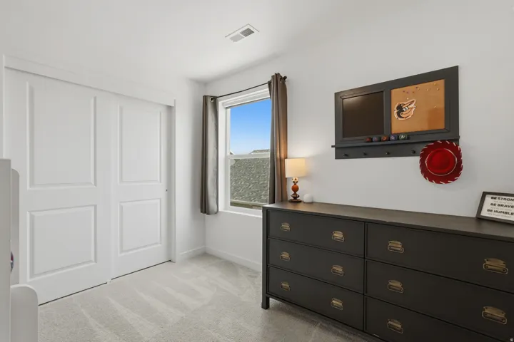 Light gray carpeting and white walls