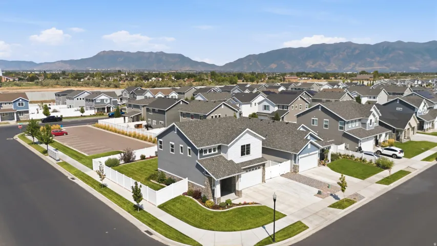 Modern residential neighborhood with uniform rooflines and diverse exterior finishes