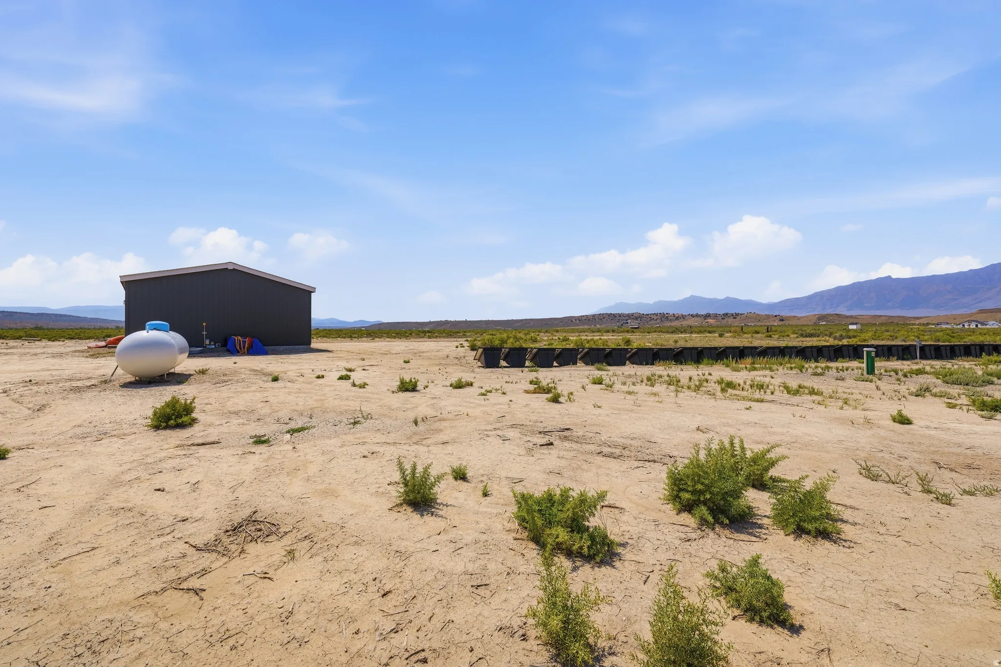 View of solar panels & propane tank