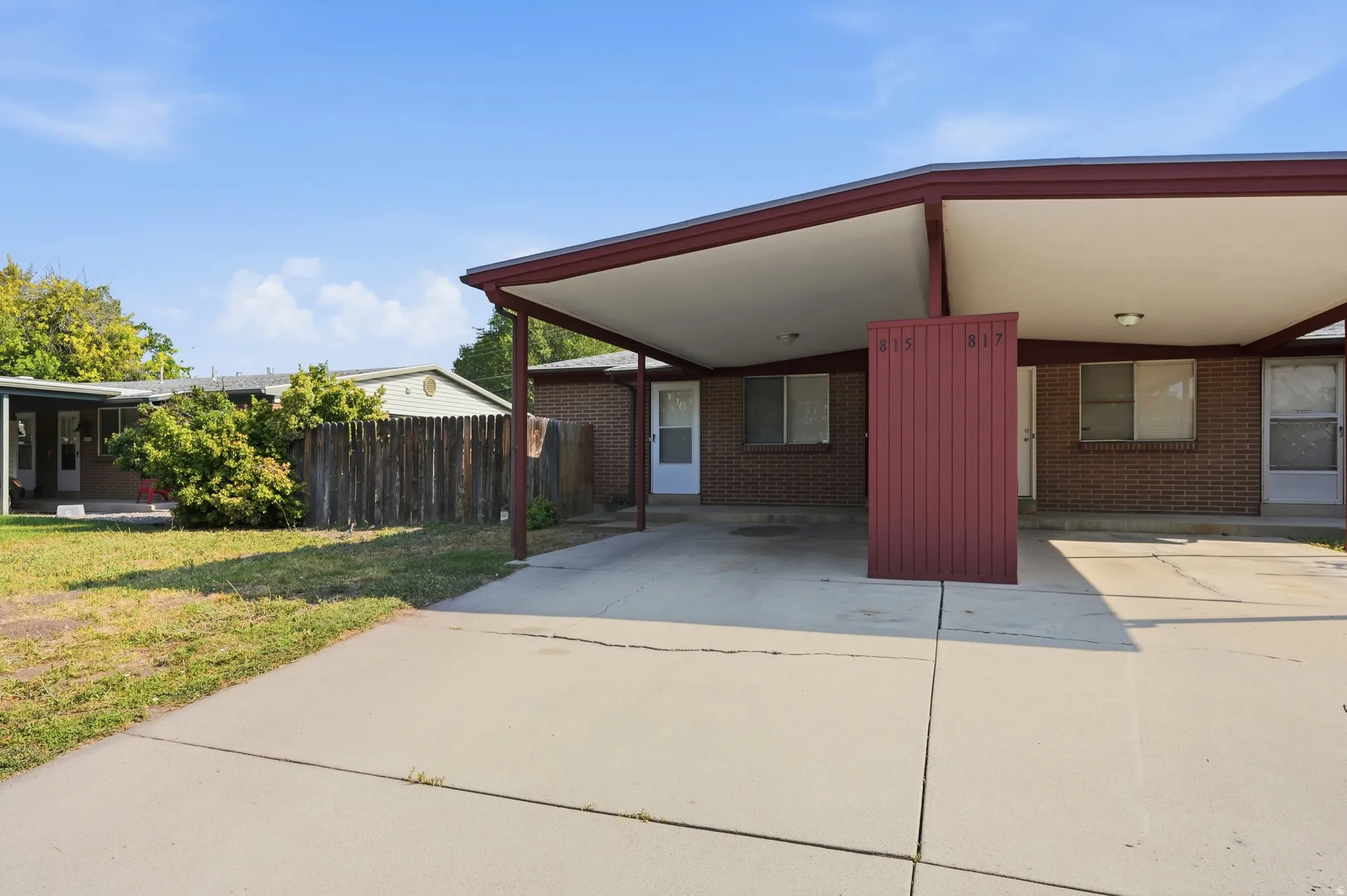 Brick exterior with covered carport