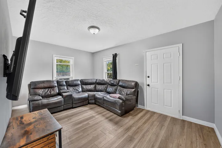 Neutral wall colors with wood-finish flooring