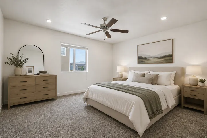 Spacious room featuring carpet flooring, recessed lighting, a ceiling fan, and a large window