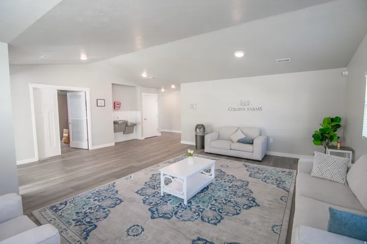 Open-concept common area featuring wood-finish flooring, recessed lighting, and light gray wall tones