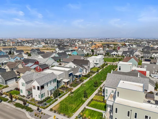 Expansive residential neighborhood featuring diverse architectural styles and abundant green spaces