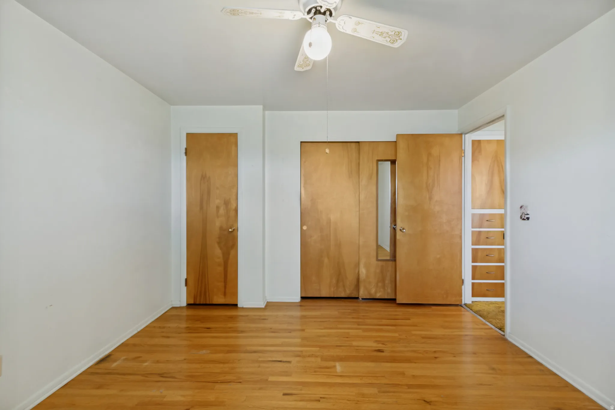 Wood-finish flooring with white walls