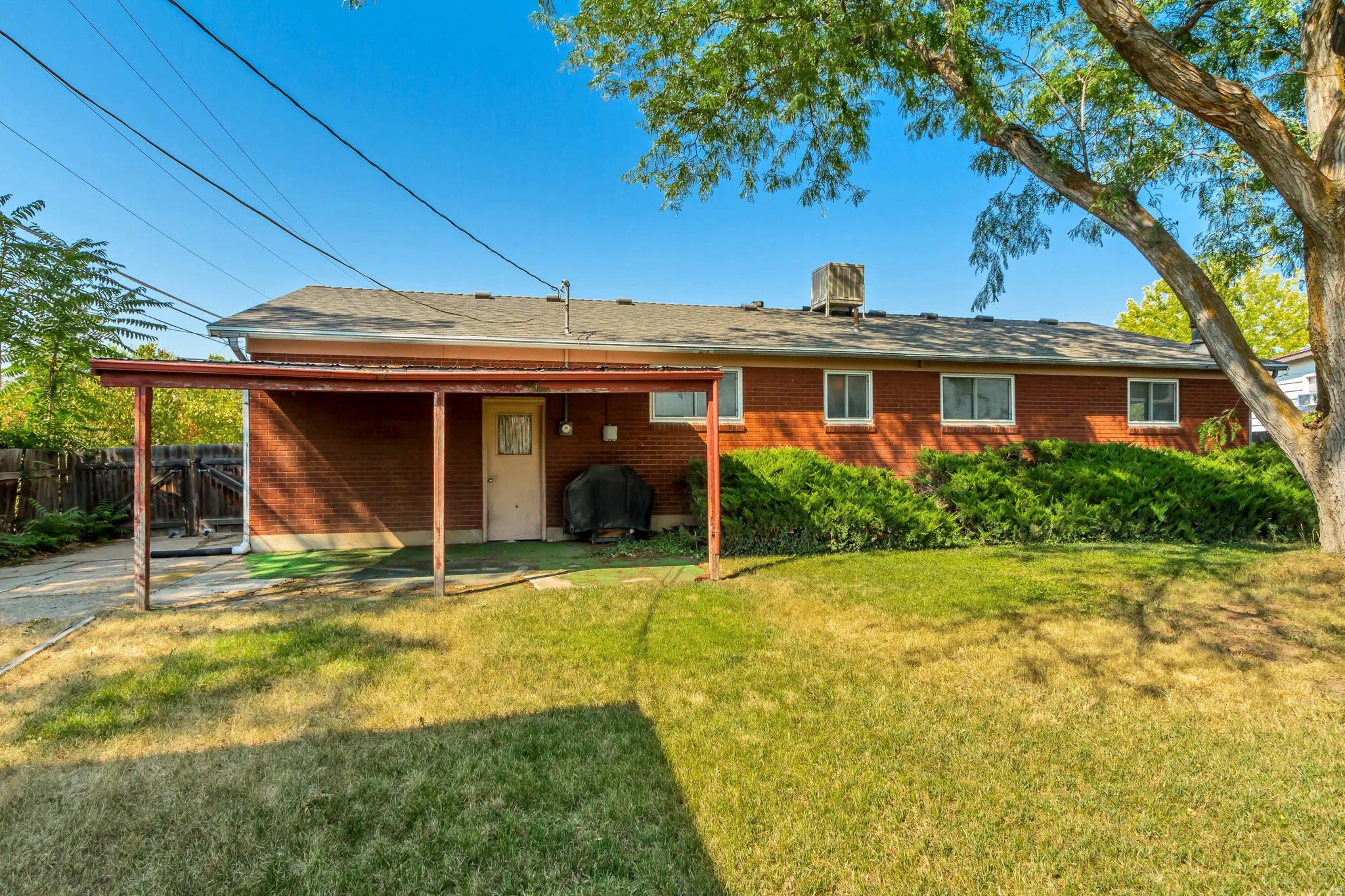 Red brick exterior with multiple windows