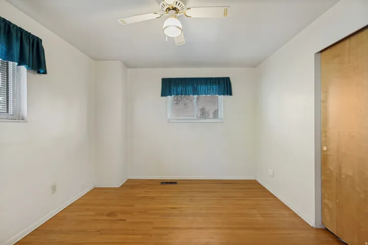 Wood-finish flooring with white walls