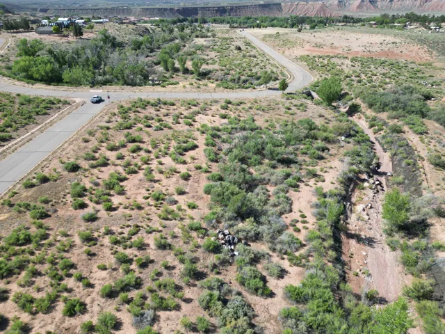 Expansive undeveloped land featuring natural desert vegetation