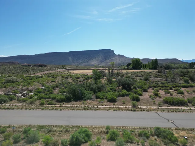 Expansive open terrain with natural vegetation