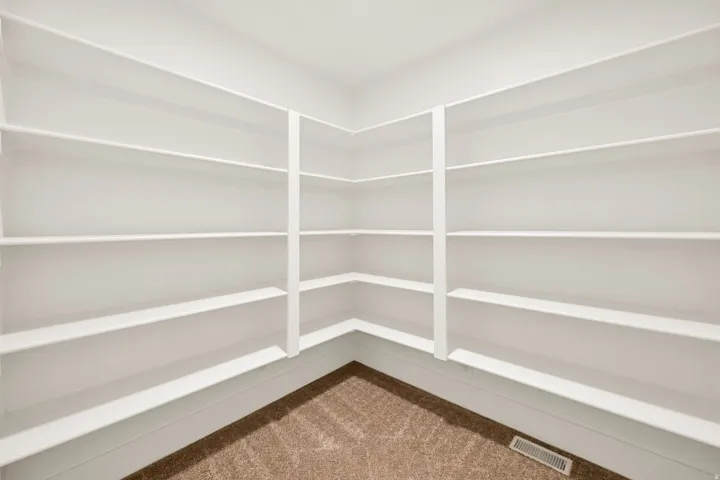 Built-in shelving with white finish