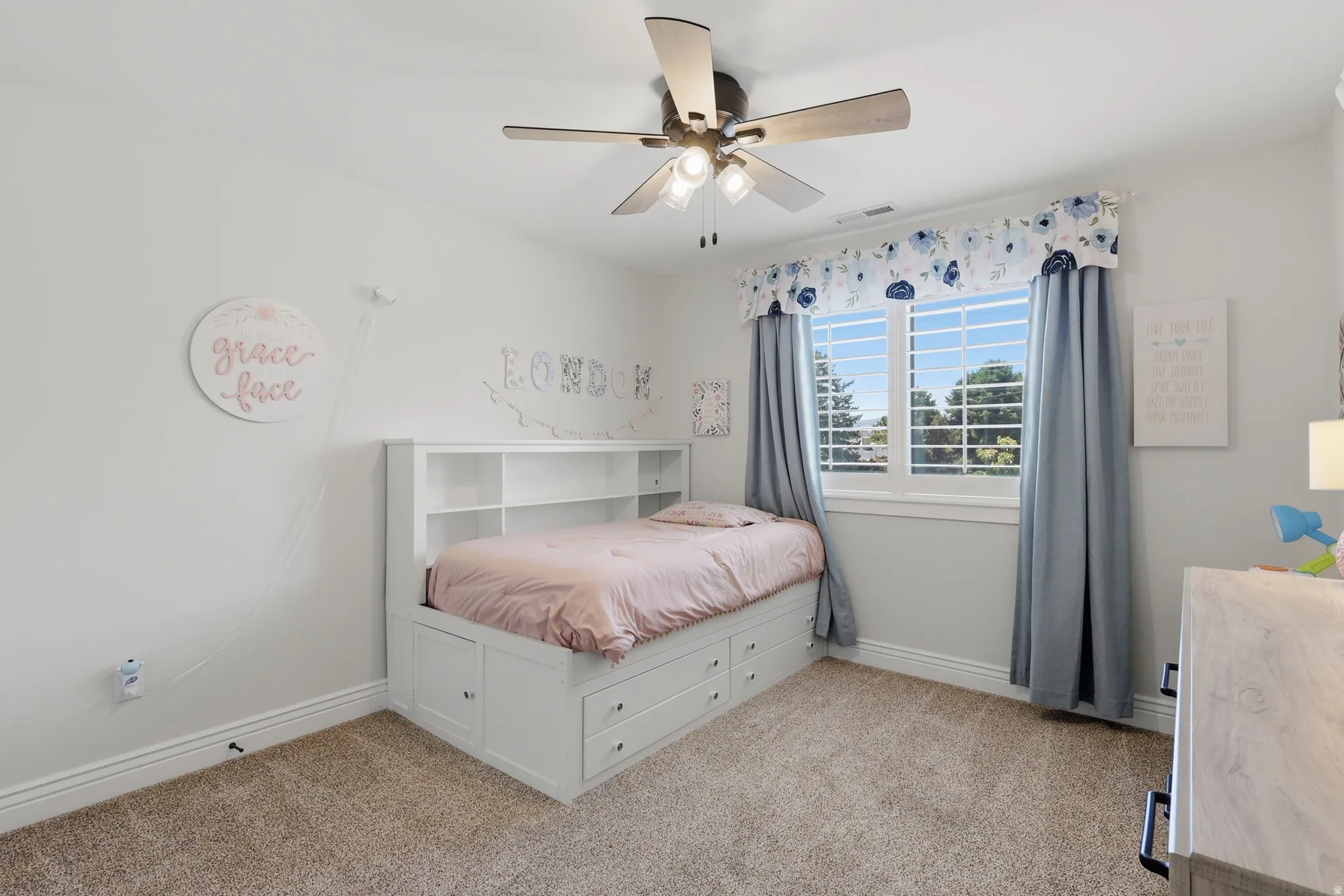 Built-in bed frame with integrated storage and shelving