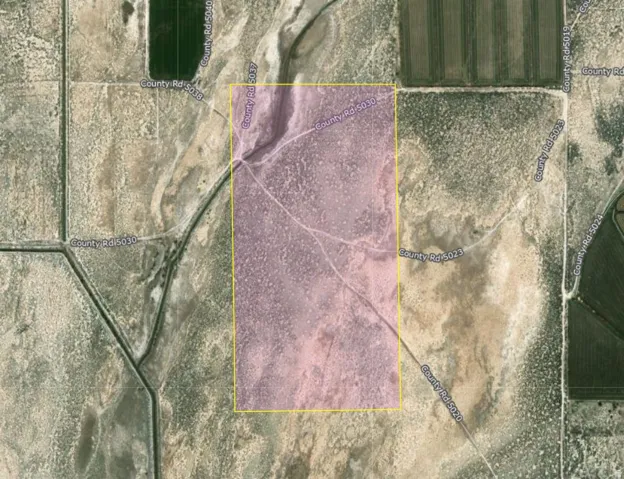 Aerial Map. Outlining the property boundaries and surrounding County Roads