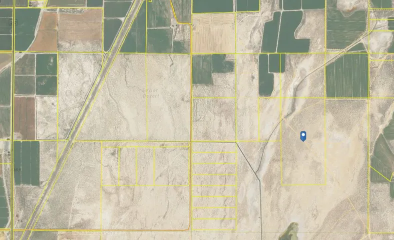 Aerial Property Map. Depicting the the property's location and boundaries within the surrounding agricultural and developed land parcels