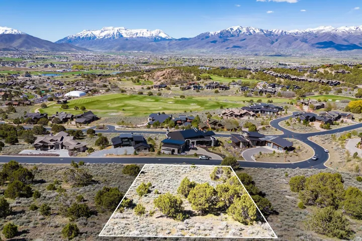 Expansive land parcel featuring natural shrubbery and varied terrain