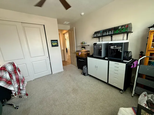 Wall-to-wall carpeting and neutral wall tones