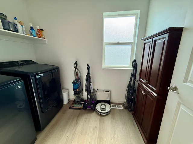 Wood-finish flooring with white walls