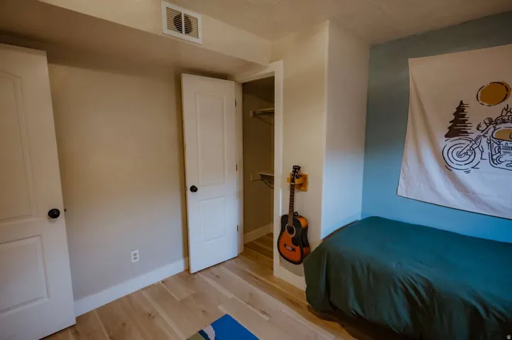 Light wood-finish flooring with crisp white trim