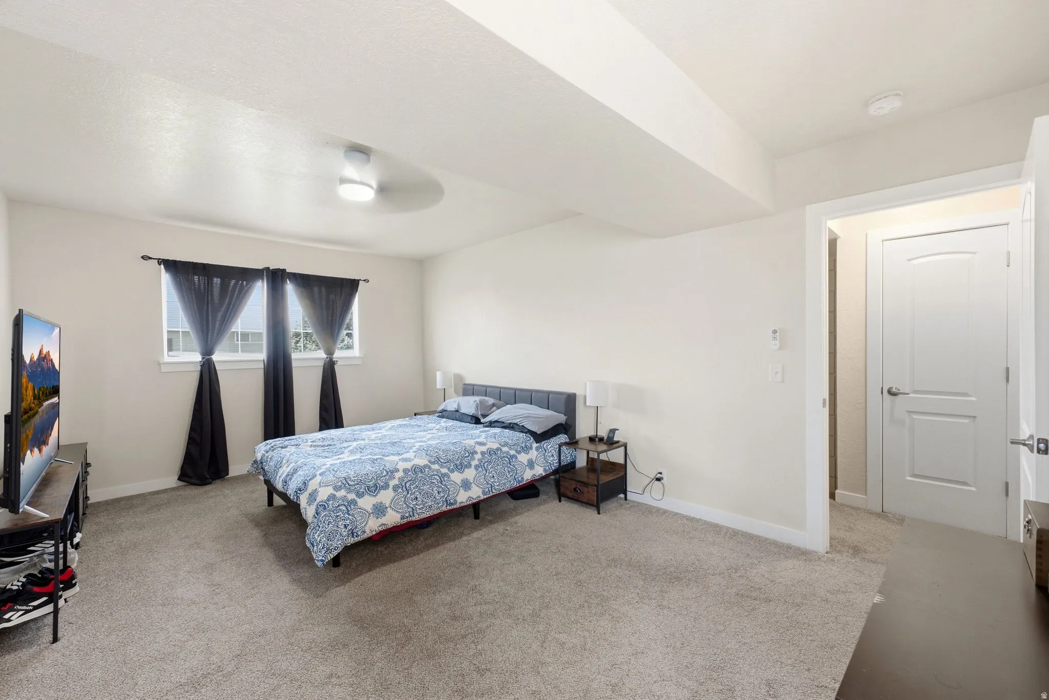 Neutral-toned carpeting and walls