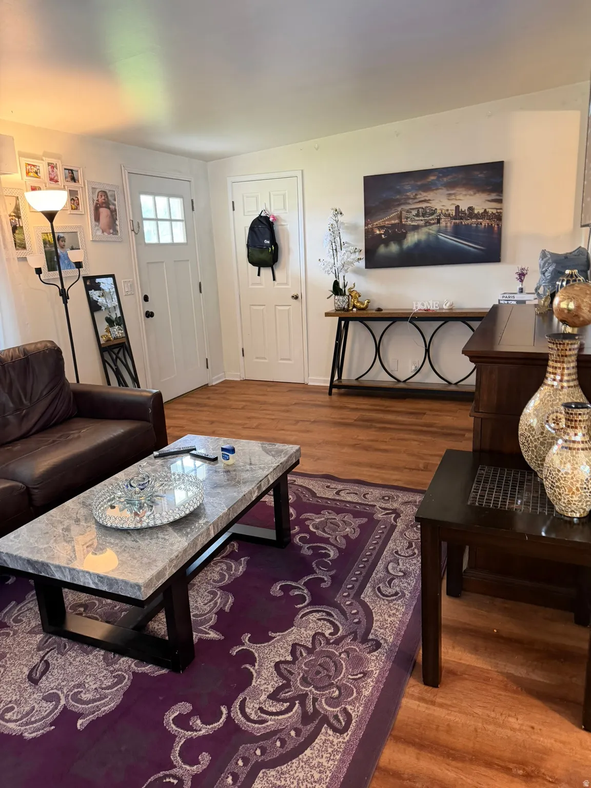 Wood-finish flooring throughout the space