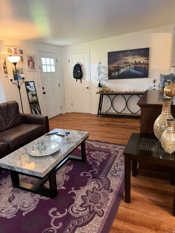 Wood-finish flooring throughout the space