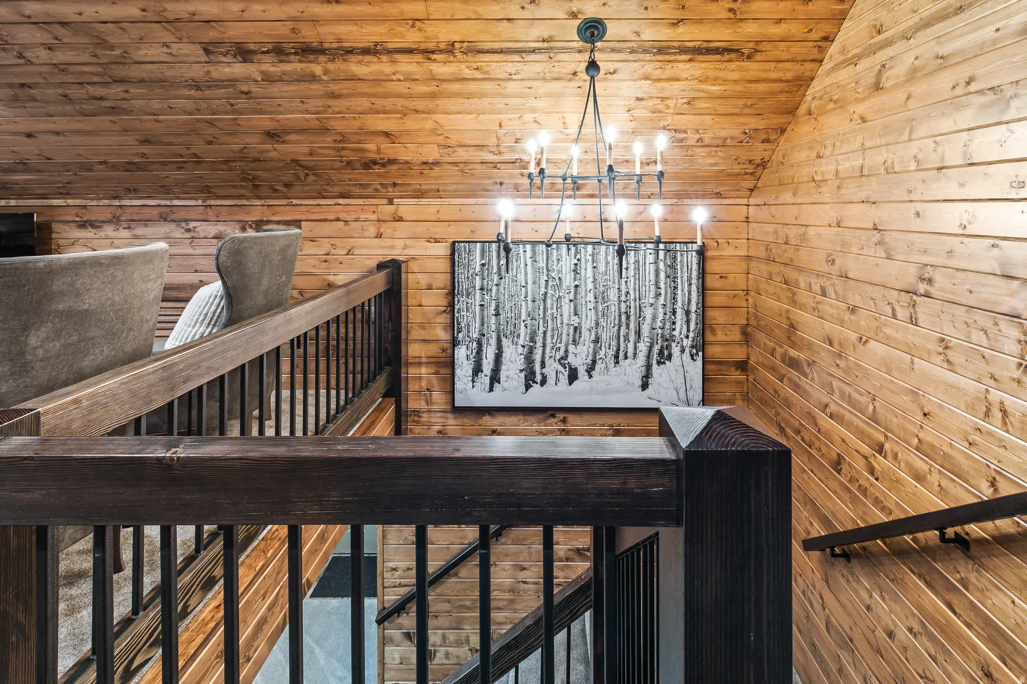 Wood-paneled walls and ceiling with an angled profile
