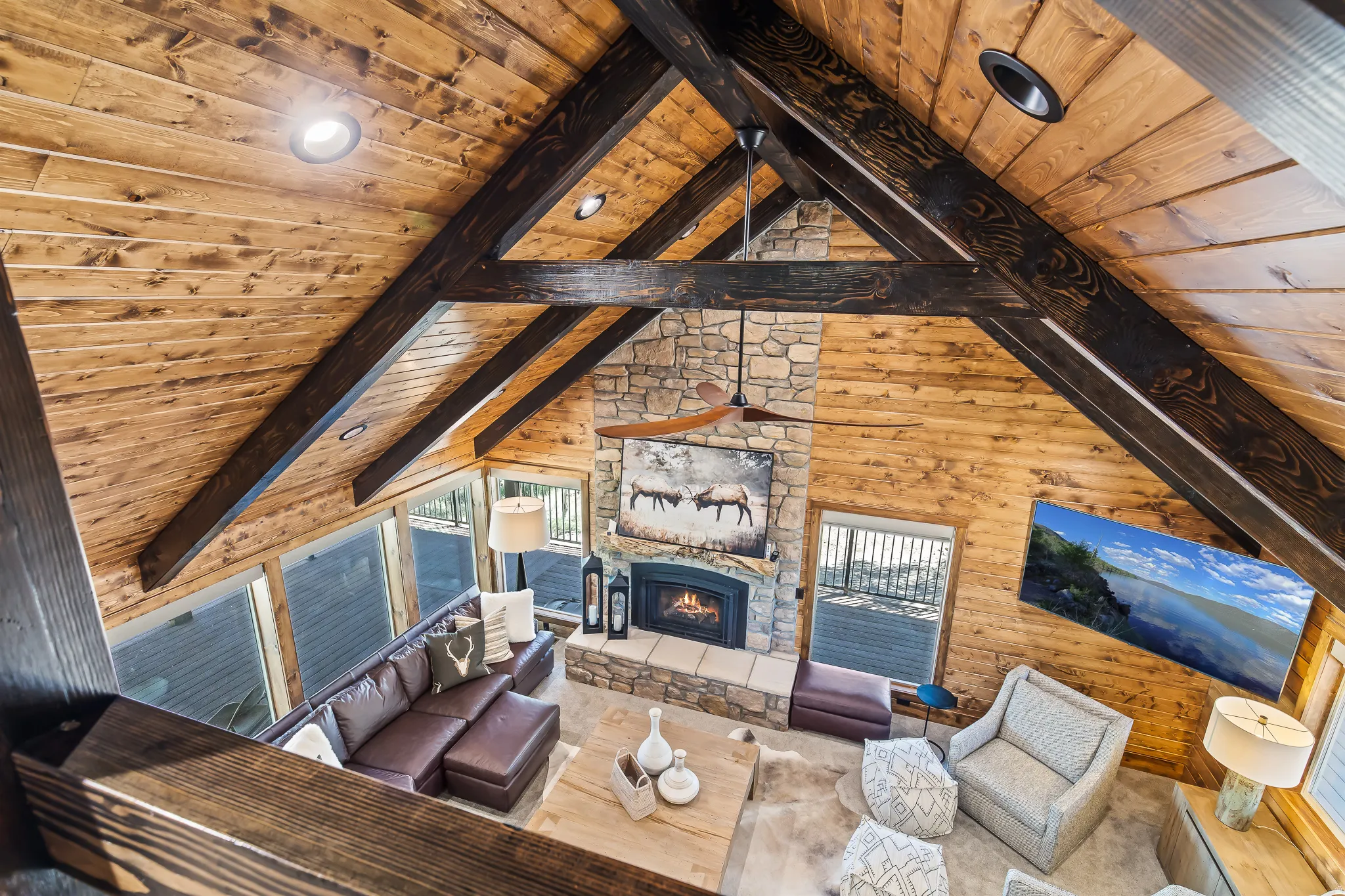Vaulted wood-paneled ceiling with exposed wood beams