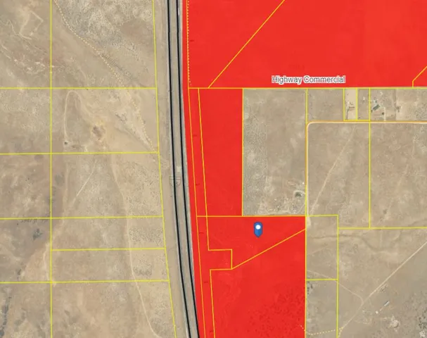 Property Boundary Map. Aerial survey indicating the parcel location relative to Highway Commercial corridor and surrounding land divisions