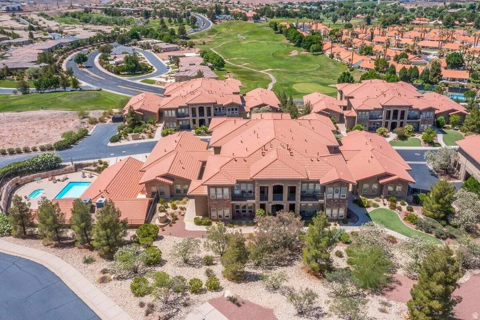 Terracotta-tiled roofs, a large central courtyard, and a putting green