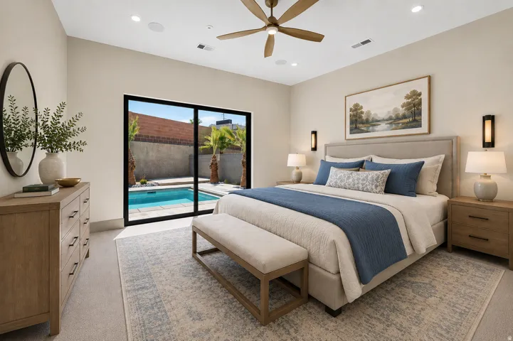 Sliding glass door opening to a private pool, featuring recessed lighting, a ceiling fan, and sconce lighting