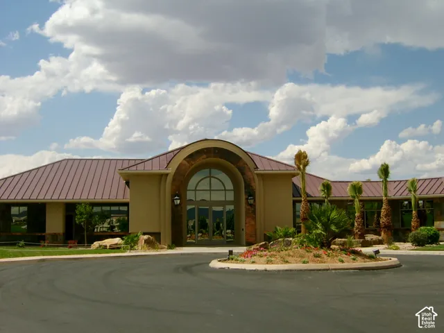 Inviting circular driveway with a central landscaped island