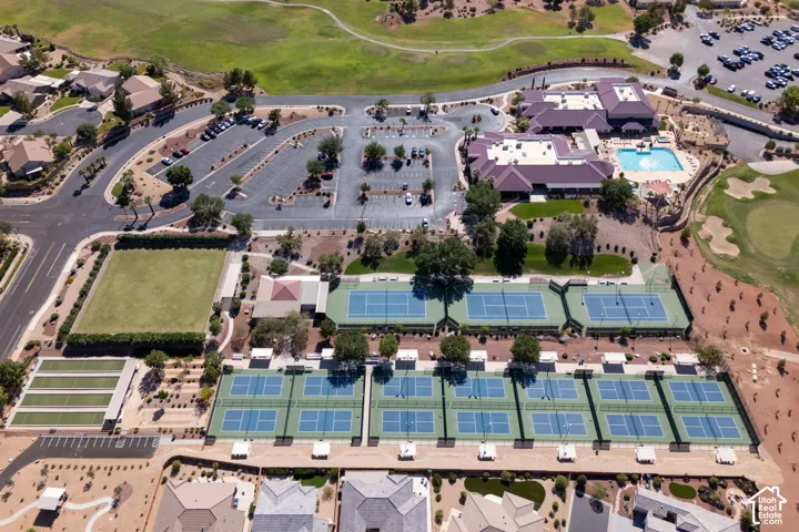 Community amenities featuring multiple tennis courts, a swimming pool, and a golf course