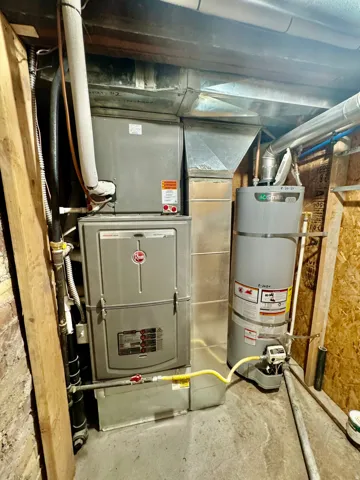 Furnace and water heater with exposed ductwork and piping