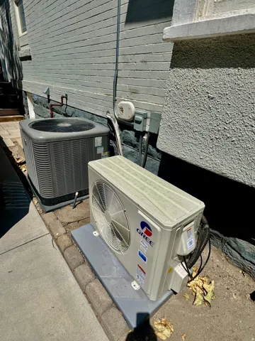 Exterior mechanical systems including a central air conditioning unit and a mini-split system