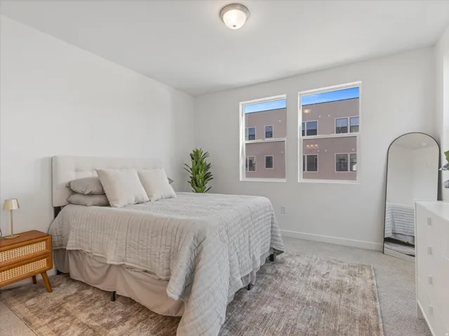 Neutral wall paint and carpeted flooring