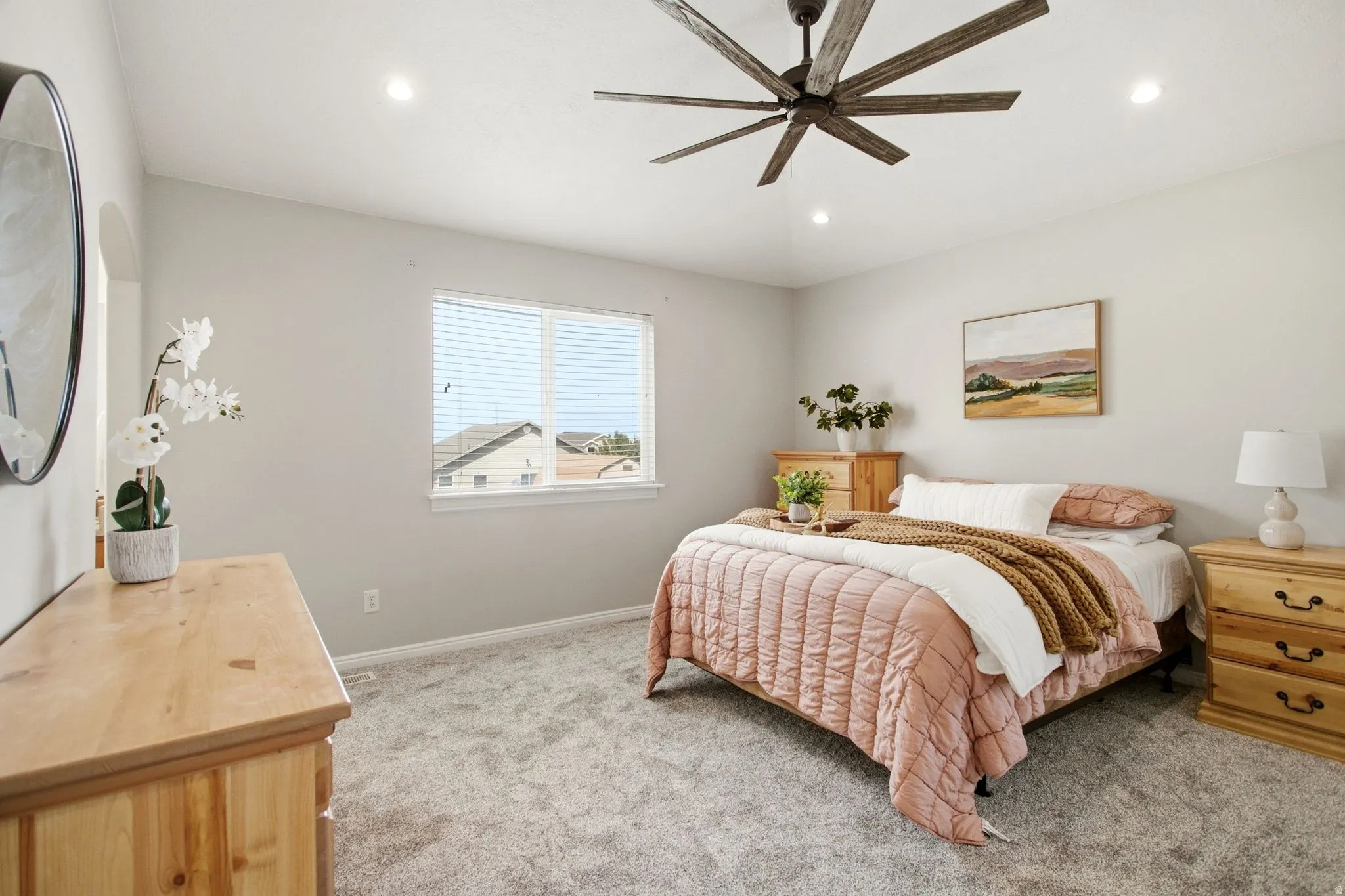Primary Suite with Recessed lighting, ceiling fan with wood-look blades, light gray carpeting, and a window with blinds