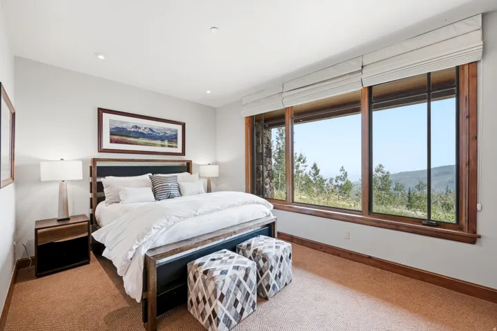Recessed lighting accents this room with carpeted flooring